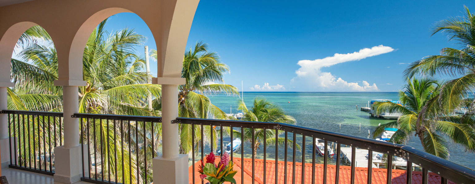 ambergris-caye-sunbreeze-suites-where-to-stay-belize2-1-1536x597.png