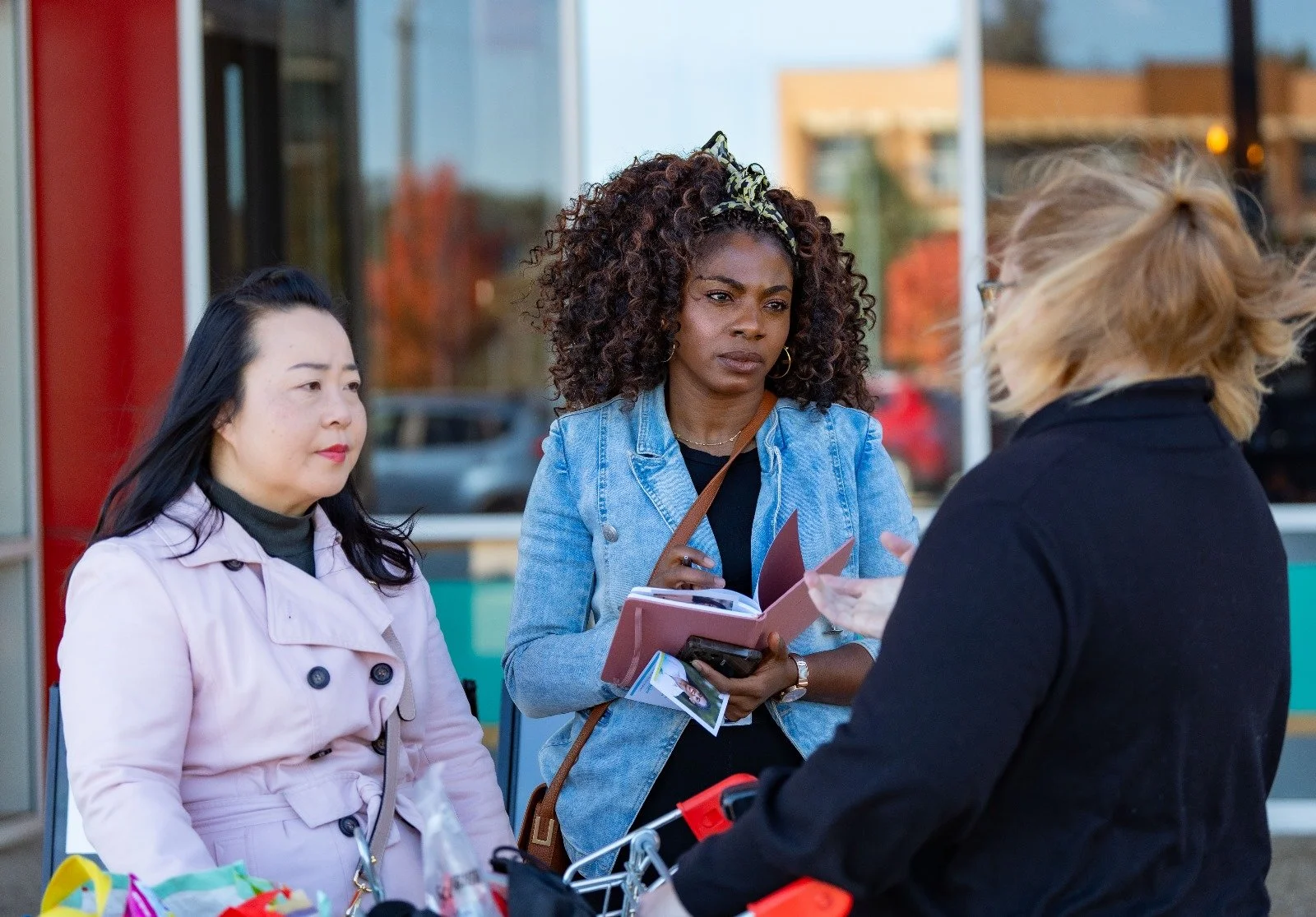 Chiaka Barry consulting with the community