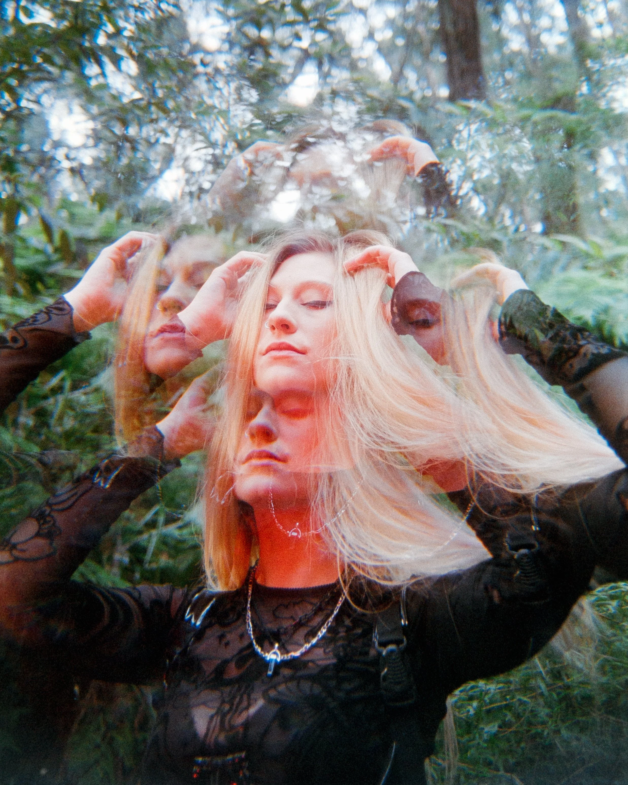 Multi image of a woman with blonde hair, in an alternative outfit, red RGB lighting glowing on her, her eyes are closed and hands on her head in a dreamlike state, shot on 35mm Film - Fuji C200