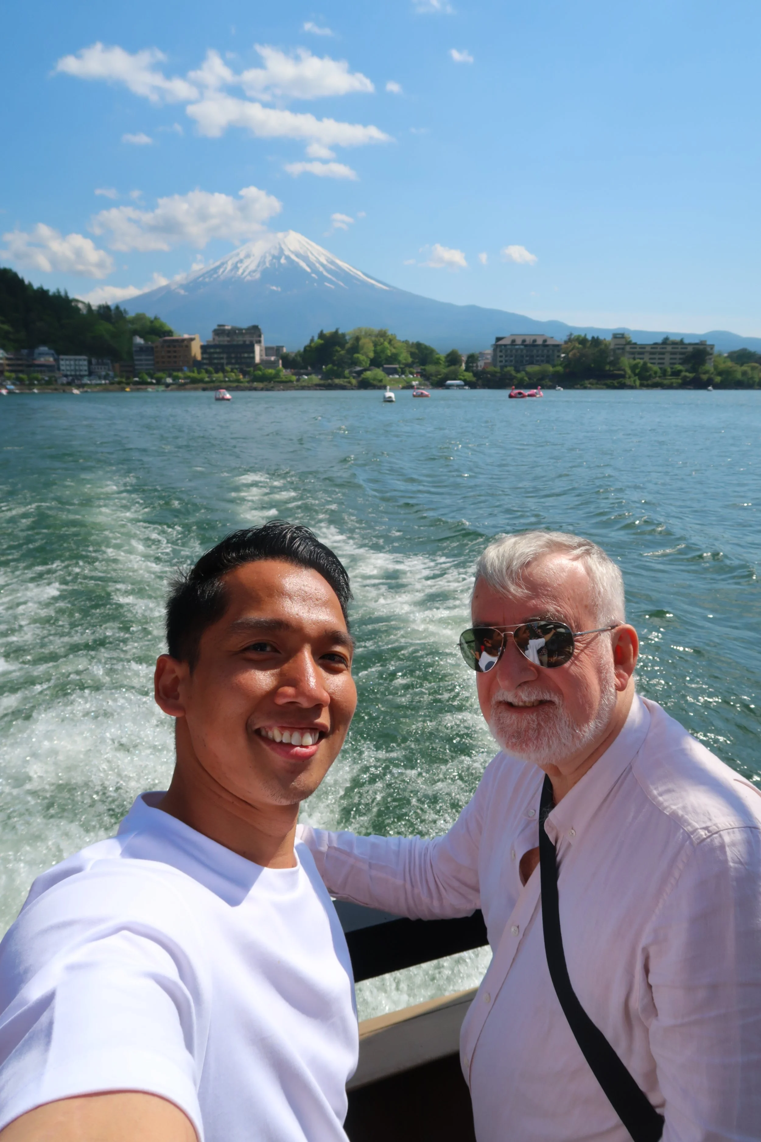 Boat ride at Lake Kawaguchi with the background of Mt. Fuji in a clear weather.