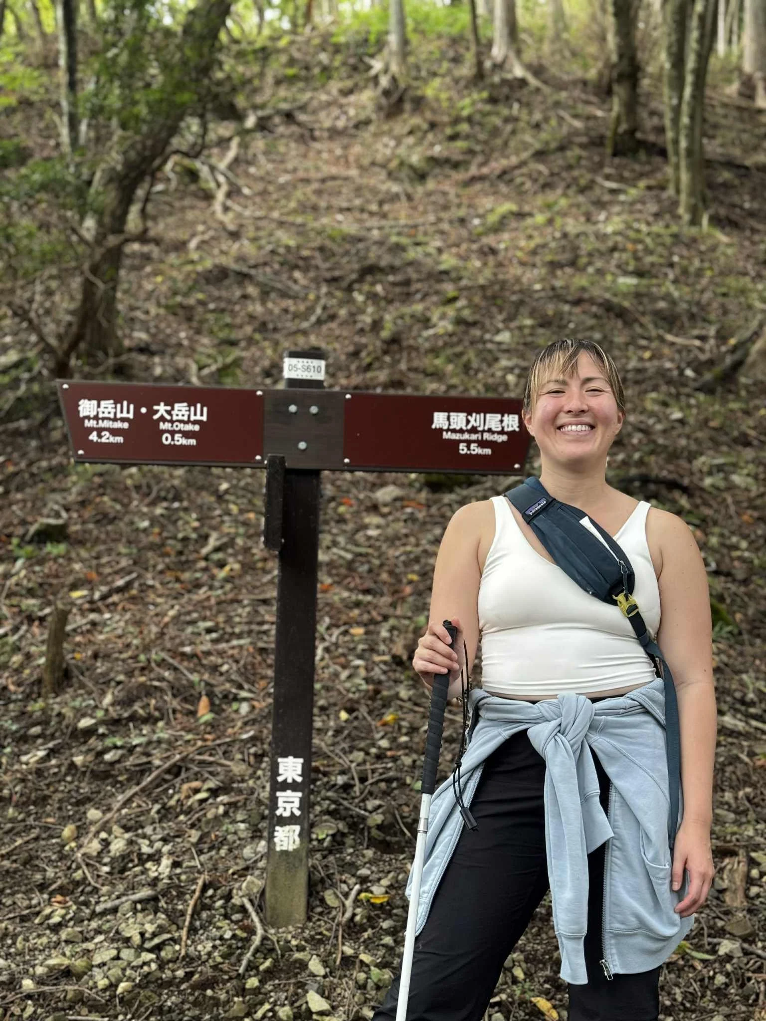 Gretchen standing at the junction. heading to the summit of Mt. Odake