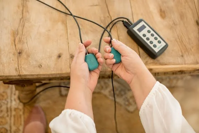 EMDR equipment. EMDR tappers. EMDR therapy. EMDR therapist. EMDR therapy near me. EMDR therapy in person. EMDR consultation. EMDR certification. Person doing EMDR therapy with Carolyn Lenz