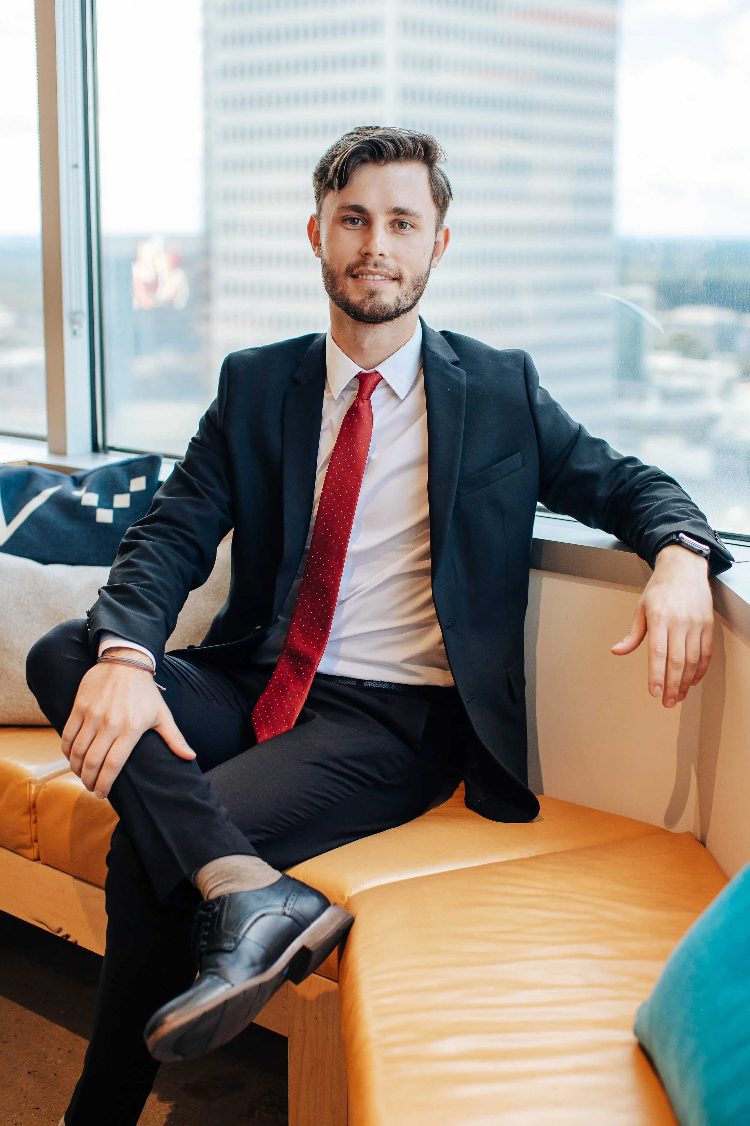 Professional branding and lifestyle portrait — Charlotte business professional in office environment by ARC Collective Co. photography.