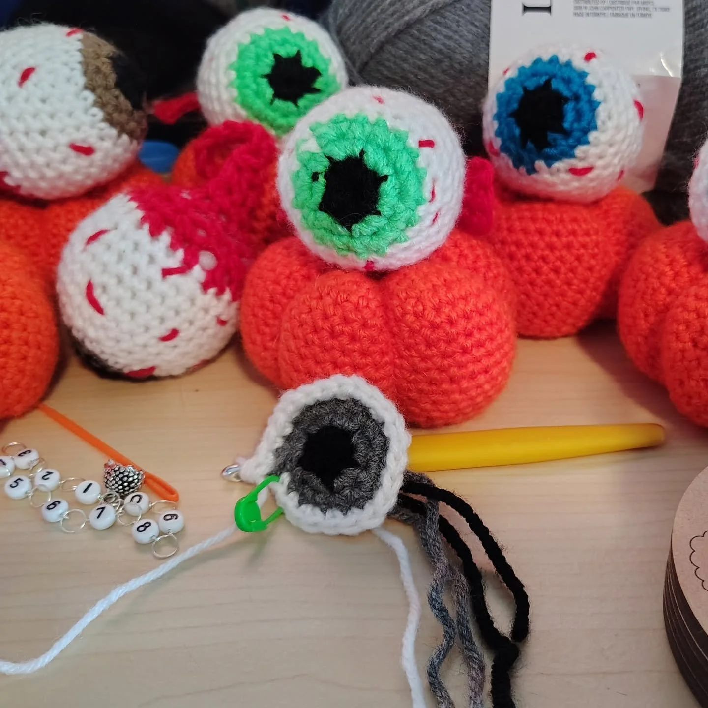 Working on some eyeball cat toys and cute little pumpkins for a Halloween market!