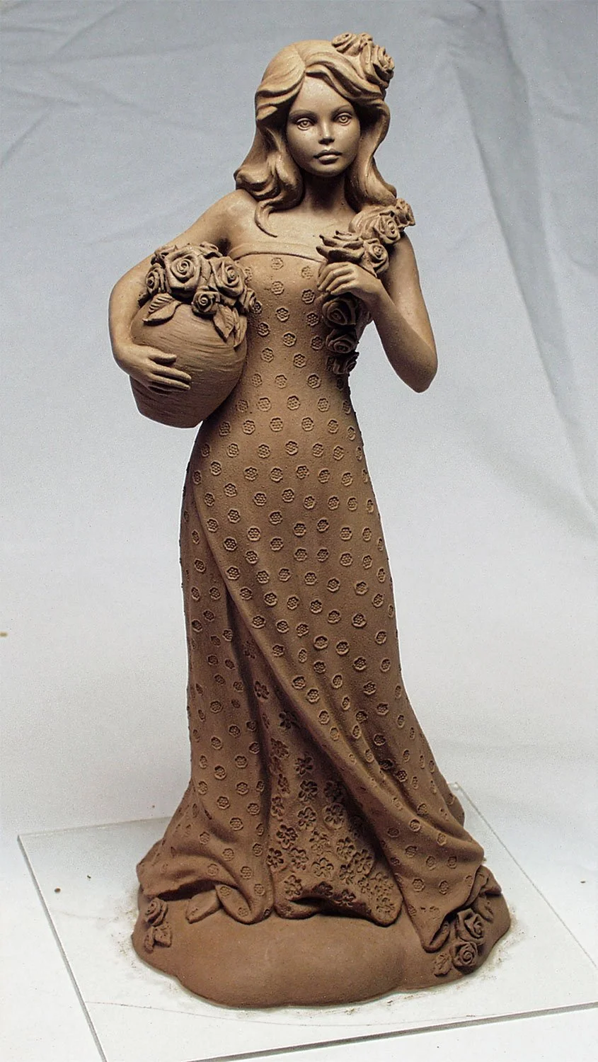 United Design commissioned this figurine, "Joy" in the early 2000s. Vicky sculpted the face while Chuck sculpted the body.