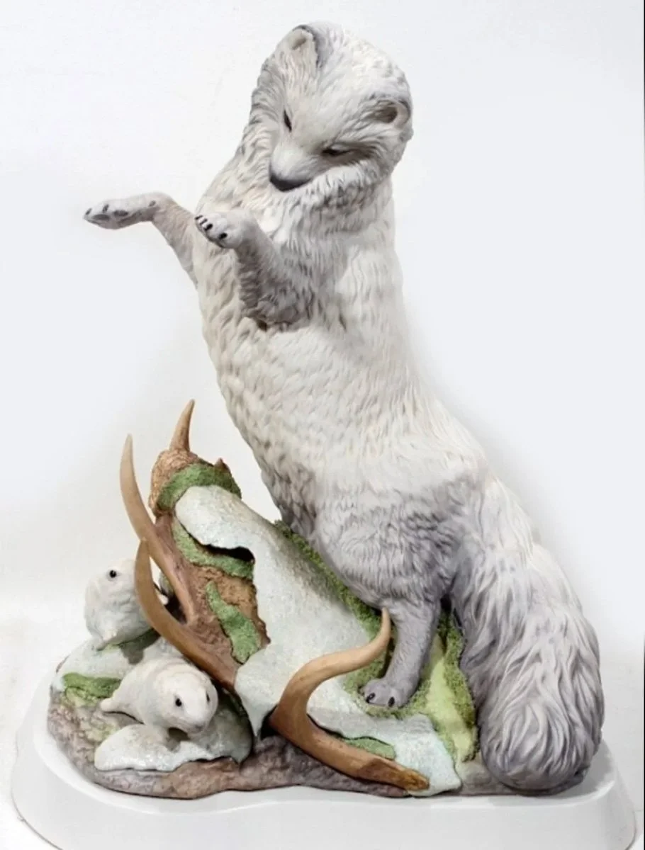 The Arctic Fox and lemmings created for Cybis Porcelains in the 1970s was among Chuck's first works. We actually adopted an Eskimo spitz at from the local shelter to use as a model. Of course we kept him (named "White Dog," of all things) and he live