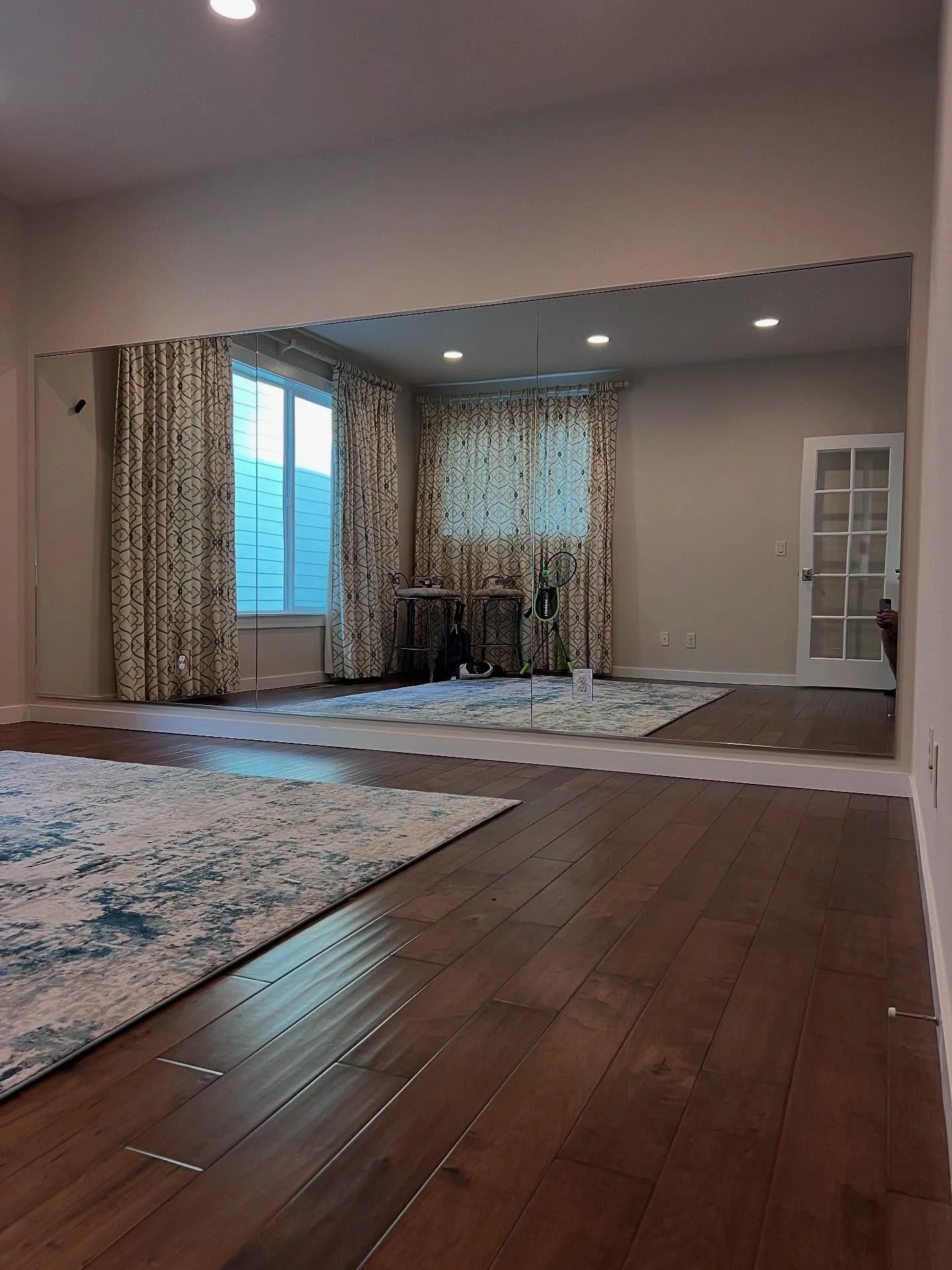 Mirror Wall with 2&rdquo; reveal on the sides #mirror #seattleglasscompany #mirrorwall #homegymmirror #bellevueglasscompany #familyowned