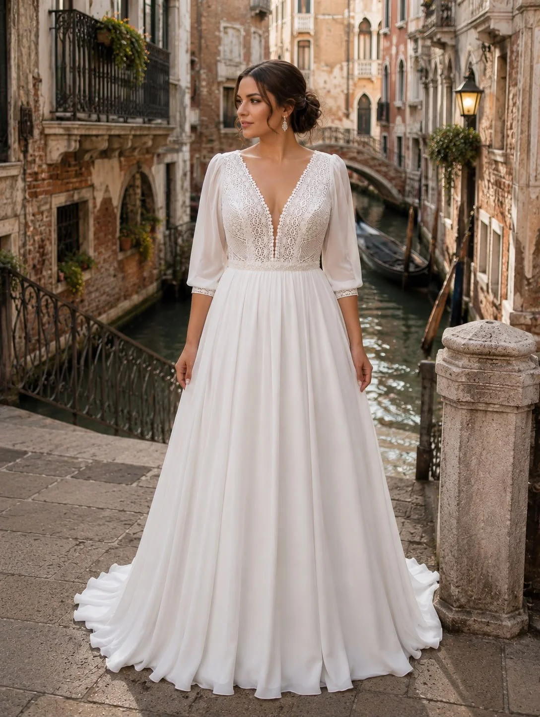 Bride in a white lace wedding gown posing on a Venetian bridge above a canal with gondolas.