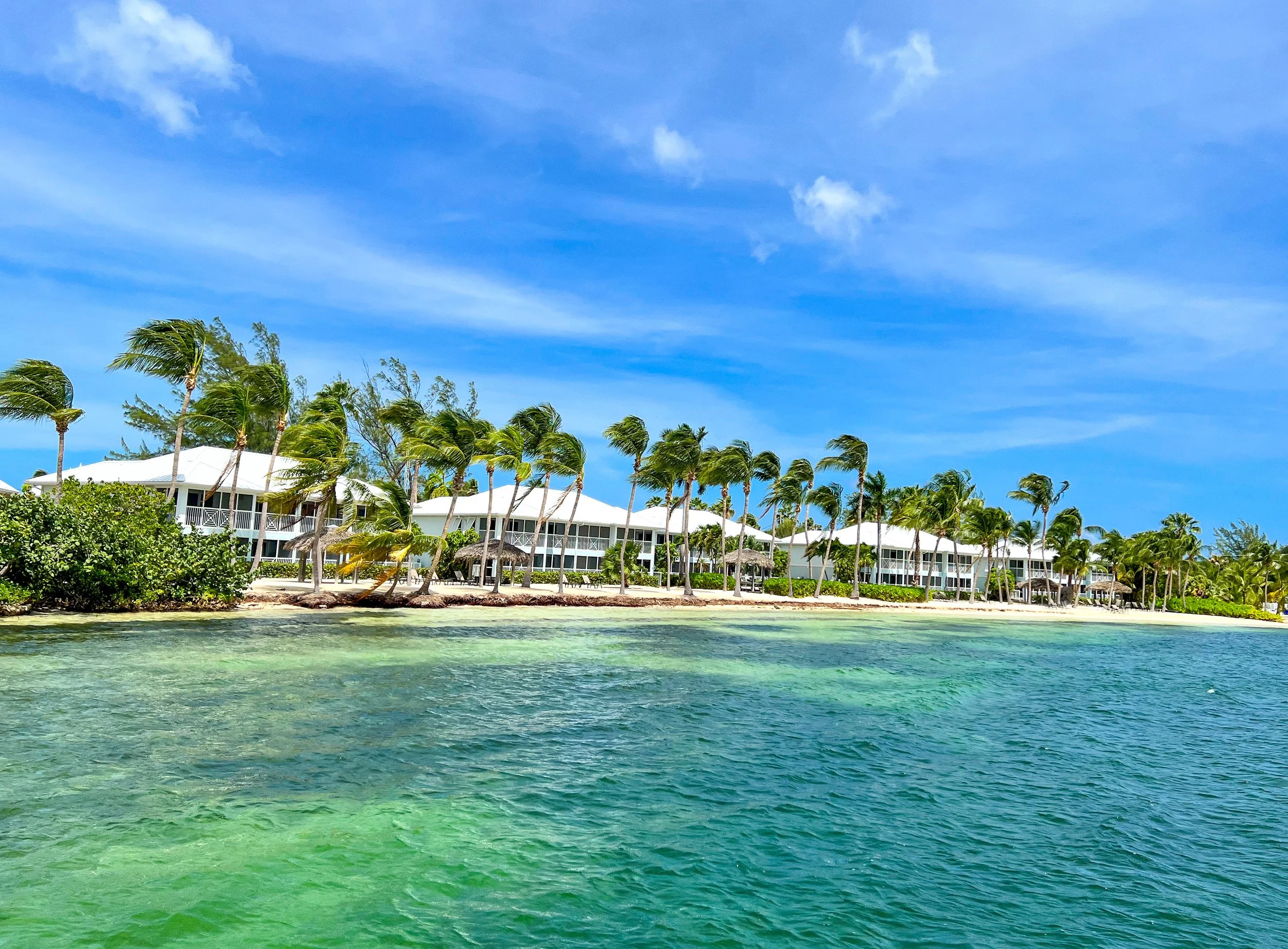  Kaibo Yacht Club , its beautiful and relaxing beach withlounge chairs and a tiki hut for shade. 