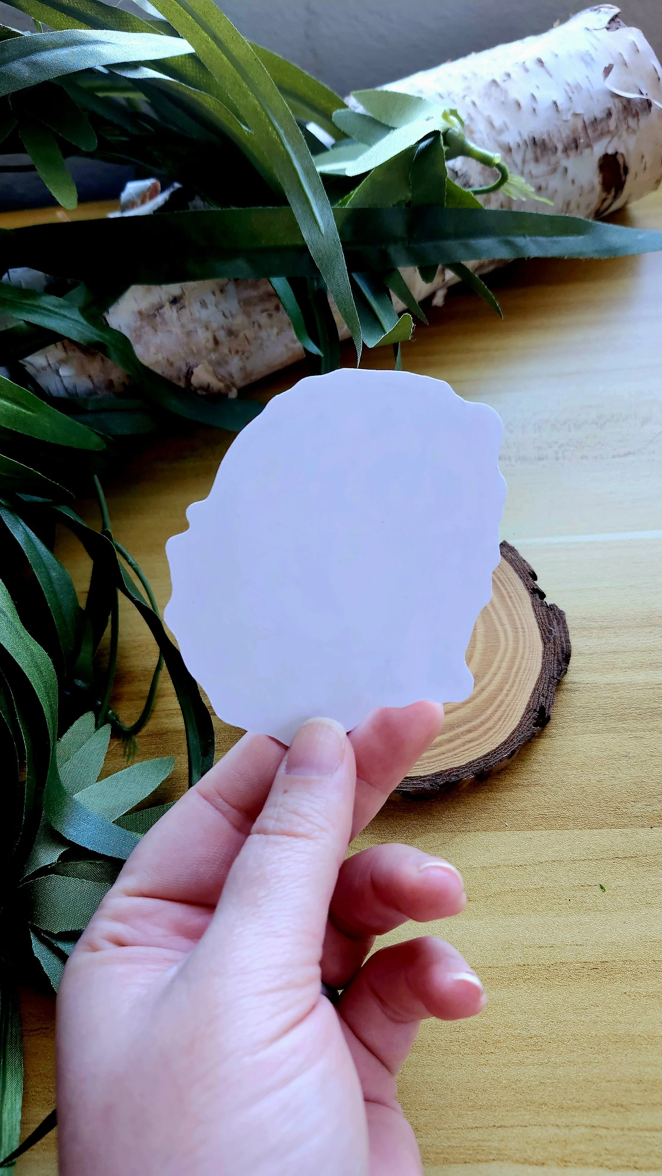 the blank back side of the raccoon sticker