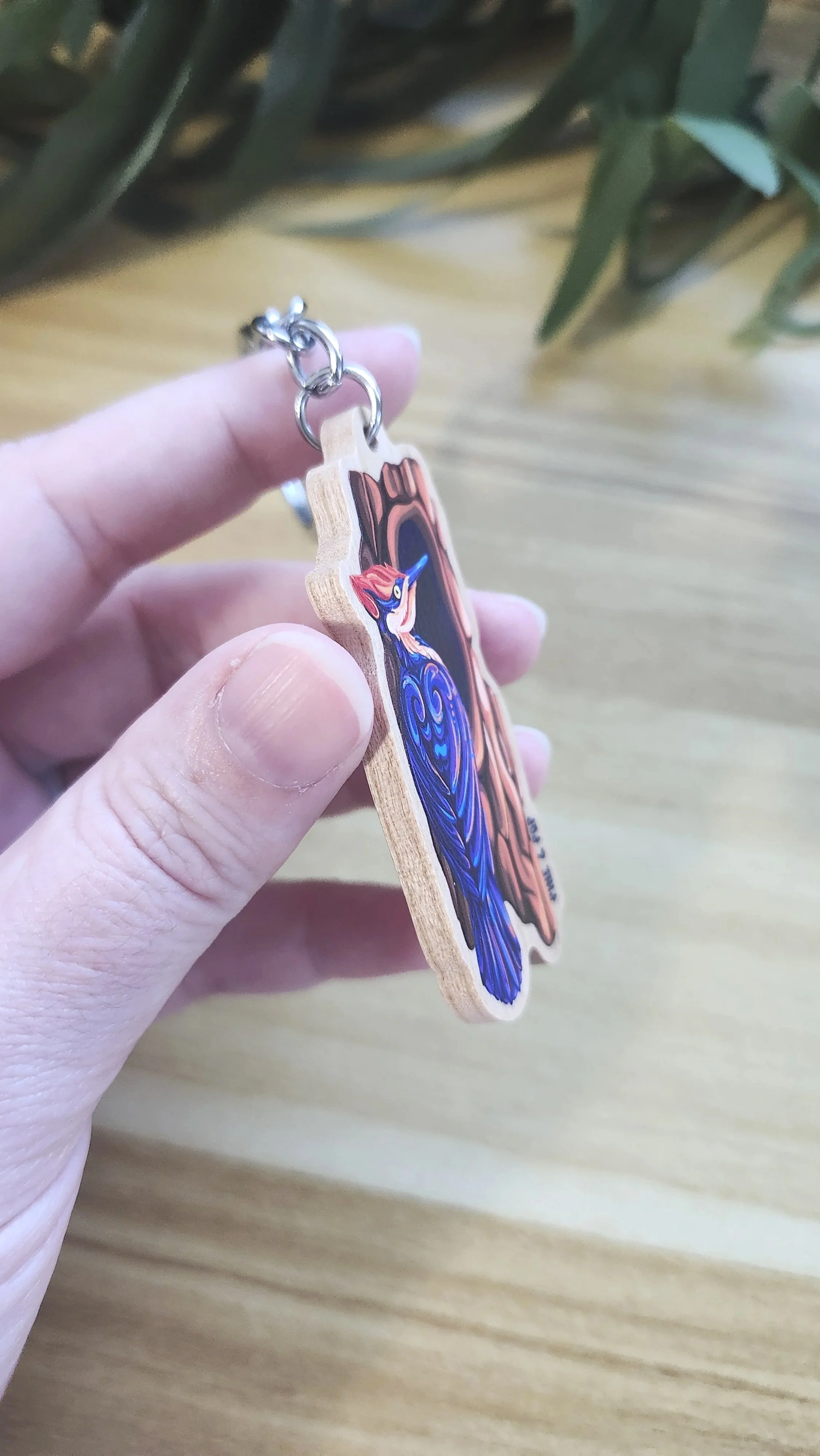 edge of pileated woodpecker wooden keychain