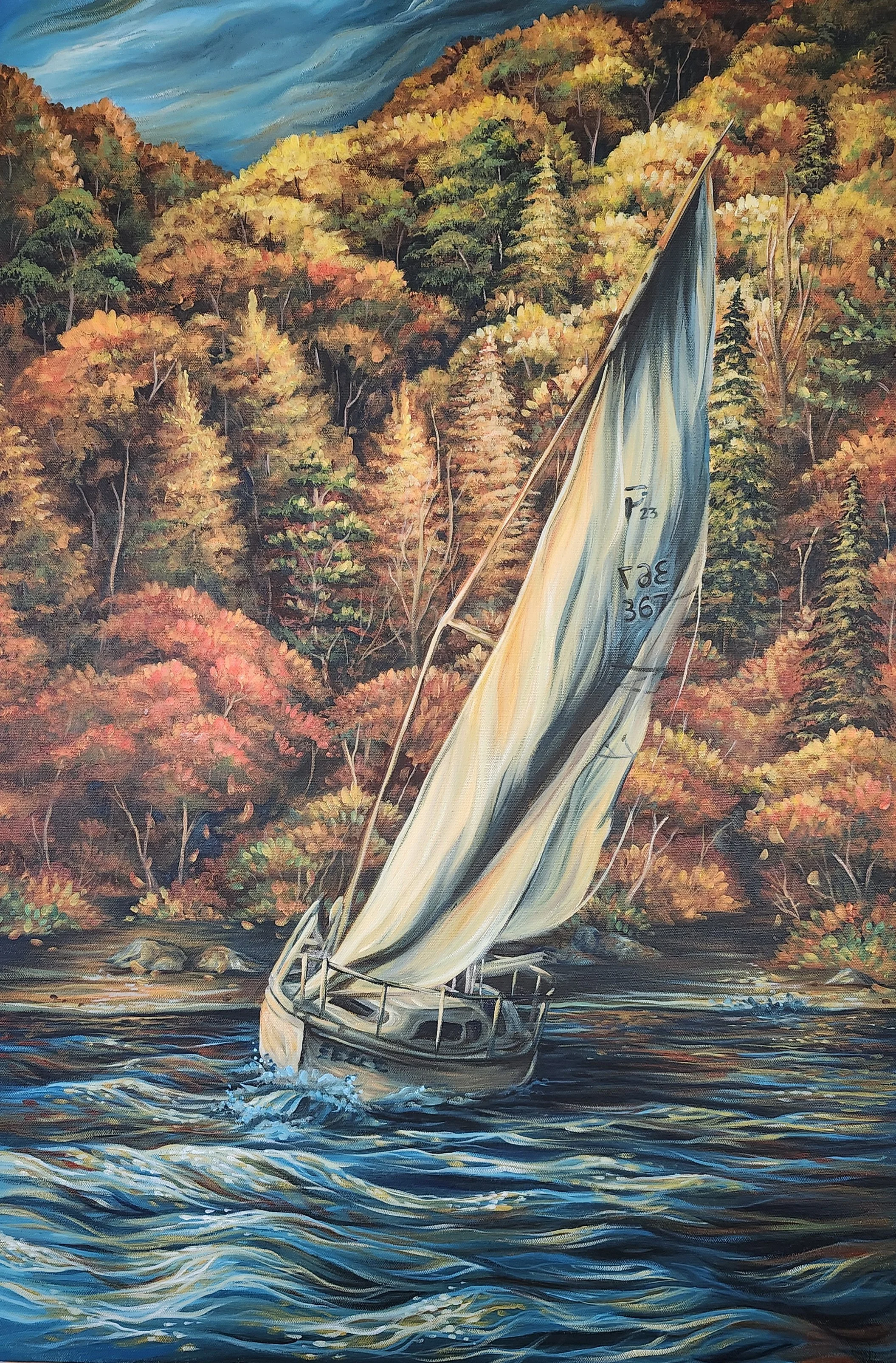 full view of adventure painting of sailboat on the water with fall foliage in the background