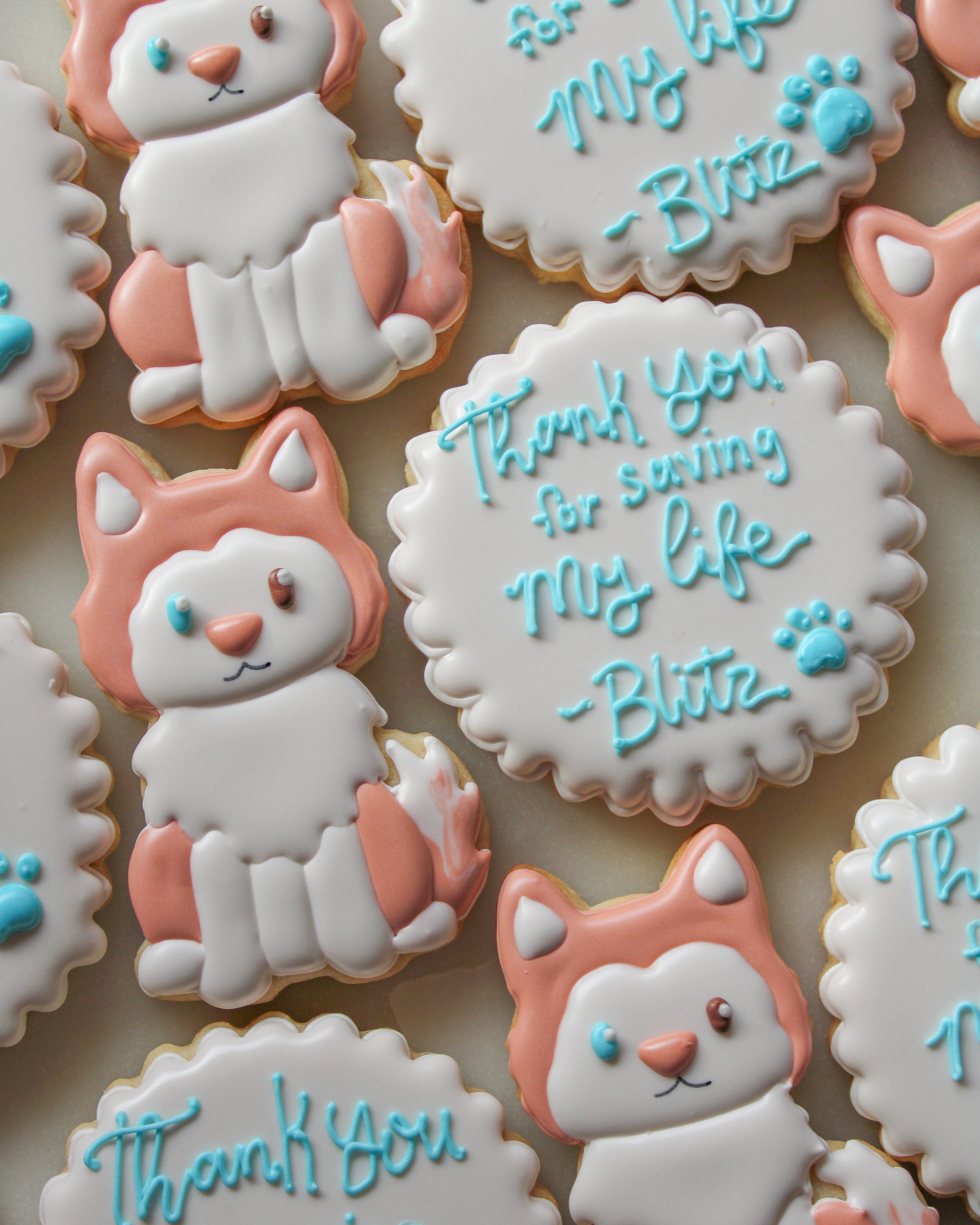 Decorated cookies with dog and thank you message.