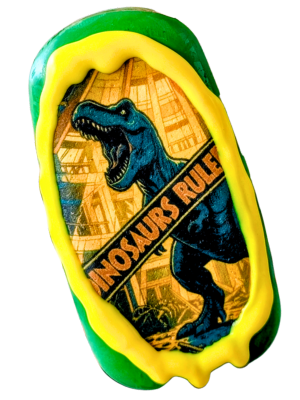A cap pop decorated with the ending scene from Jurassic park with a banner saying "when dinosaurs ruled the earth"