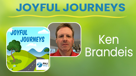 Cover of a book titled "Joyful Journeys" with a cartoon landscape of a tree, hill, and clouds. A photo of Ken Brandeis and his name are also shown. The background is green with blue and yellow text.
