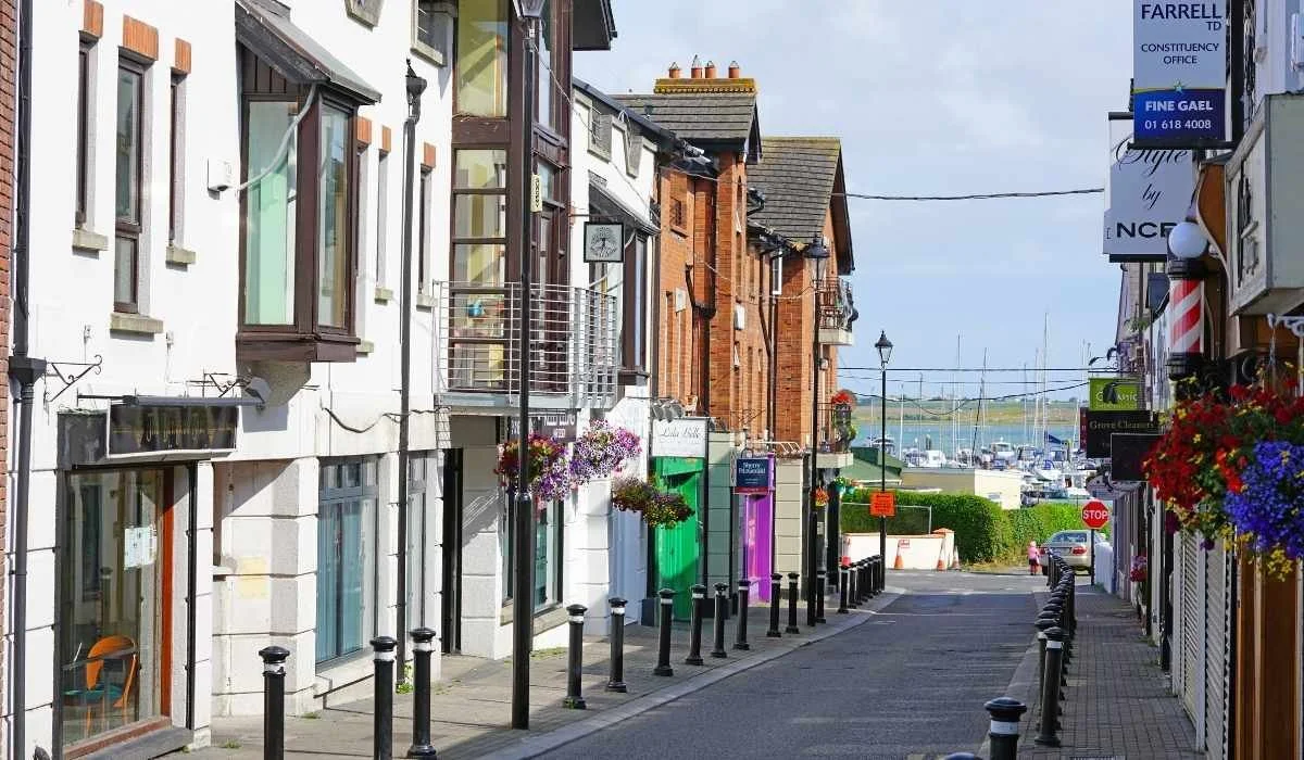 Malahide, County Dublin
A charming coastal street lined with local shops, cafés, and colourful façades leading down to Skerries Harbour.
