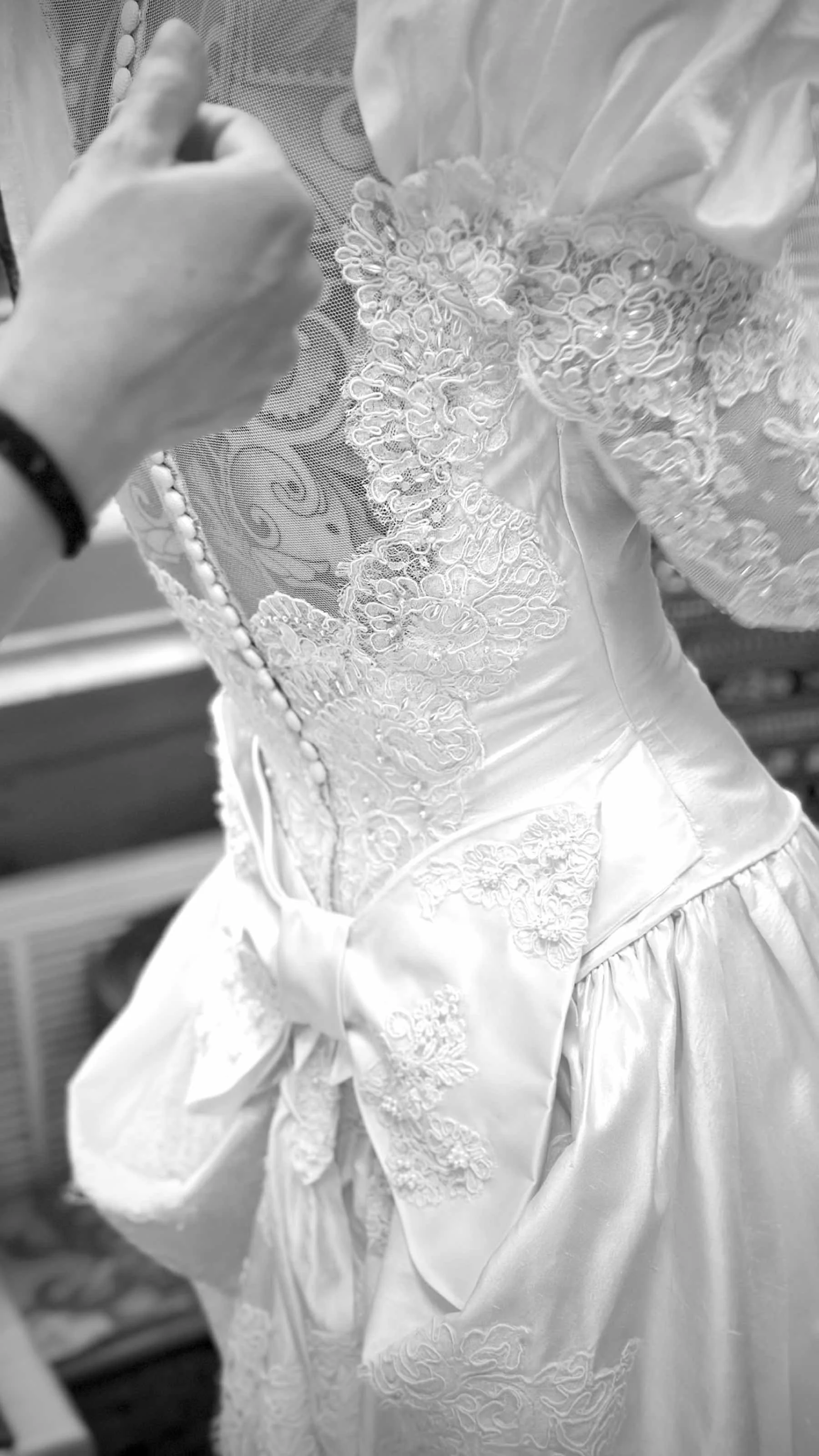 Bridal gown custom additions in Ashland, Oregon – hand-applied lace, beading, and bespoke train enhancements at Maison Volk.