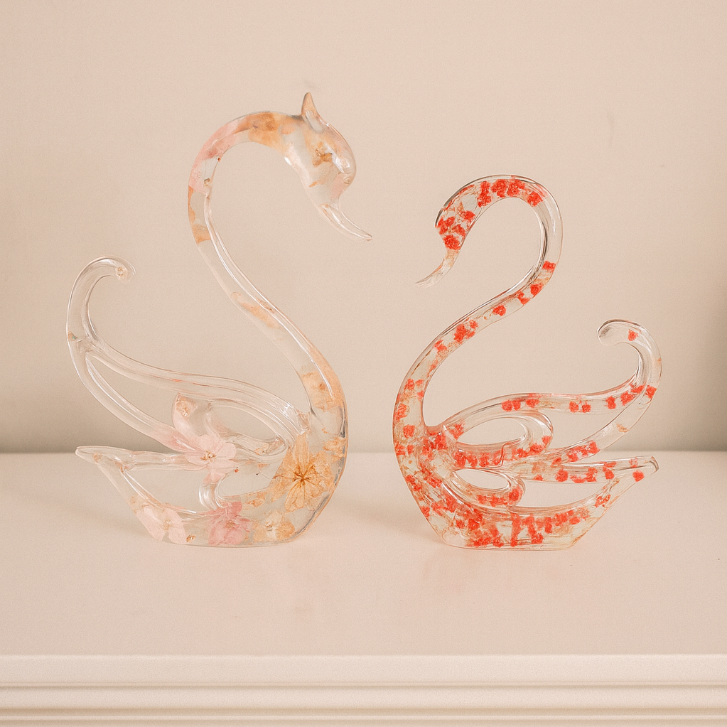 Swan+Figurines+with+Floral+Elegance.png
