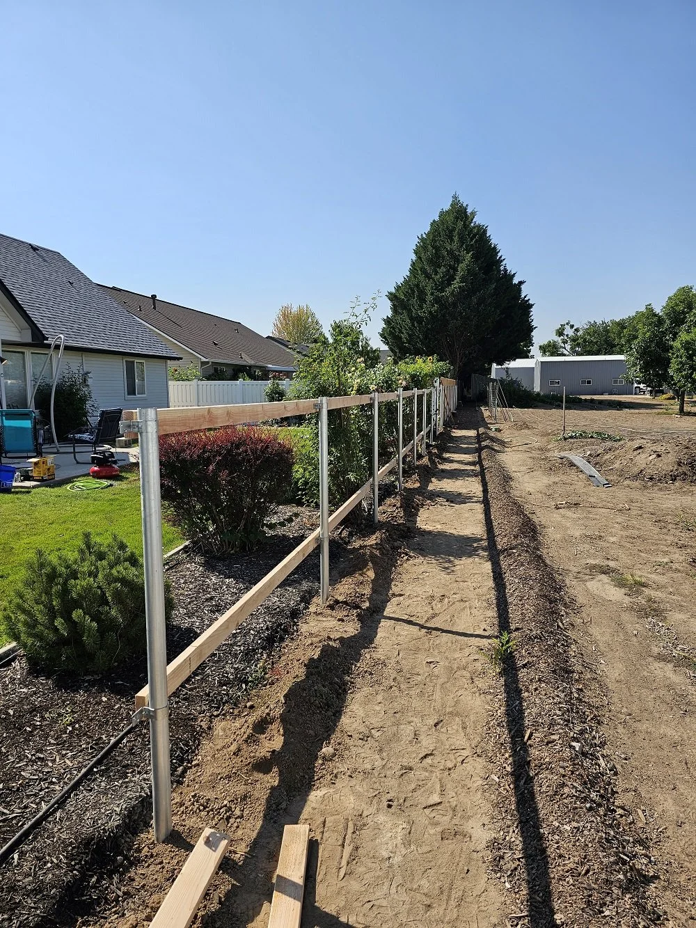 Cedar Fence With Metal Posts