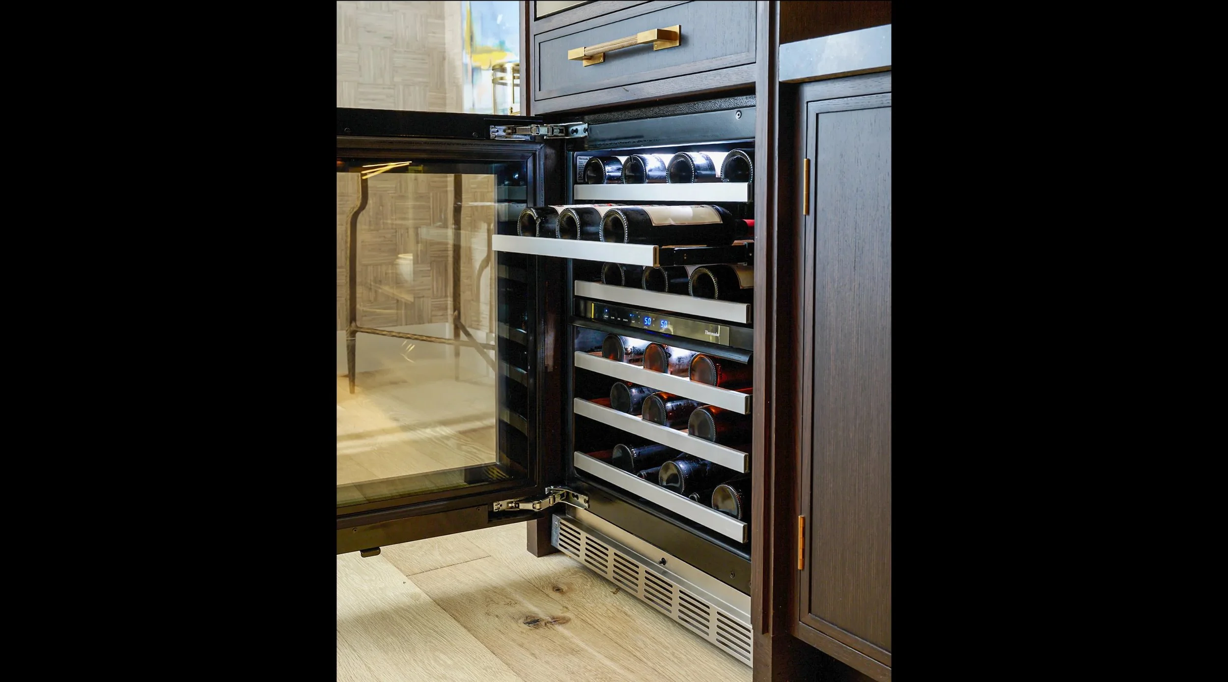 27757086_thermador-kips-bay-new-york-decorator-show-house-christopher-peacock-under-counter-wine_1155x640.jpeg