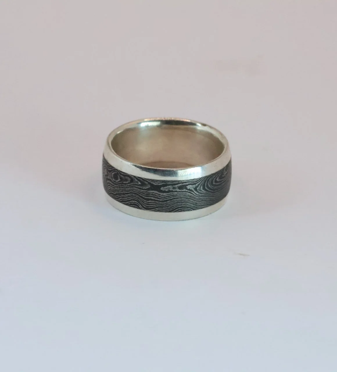 Sterling Silver & Damascus Steel Ring