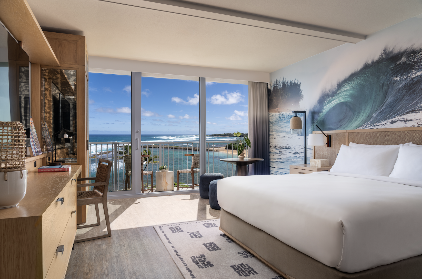 Premium Oceanfront King room at The Ritz-Carlton Turtle Bay with floor-to-ceiling windows, a private balcony, and panoramic Pacific Ocean views.