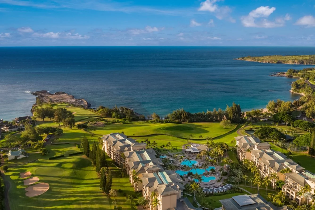 Luxury beachfront The Rtiz-Carlton Kapaluaresort with golf course and ocean views along a tropical coastline in Hawaii