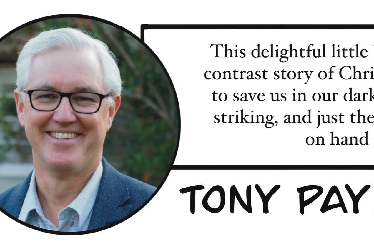 A smiling man with glasses in a suit jacket, with a background of greenery, next to a quote and his name, Tony Pay.