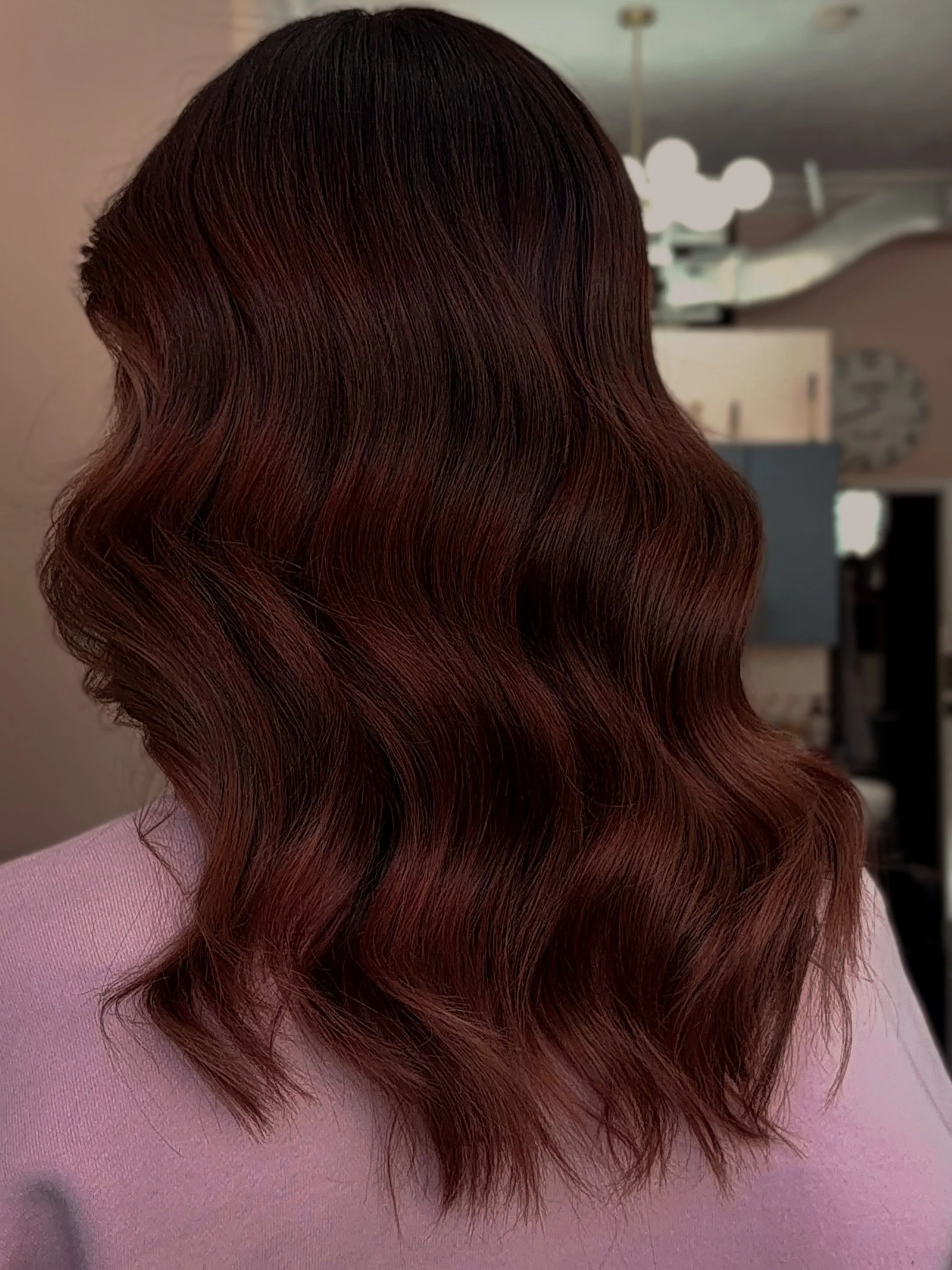 Would you believe us if we told you last week she was blonde?

Our gorgeous girl took the leap using our @davinescolor to achieve this deep, coppery garnet. We moved away from the brightness of blonde to embrace a high-voltage pigment. 

If you neede