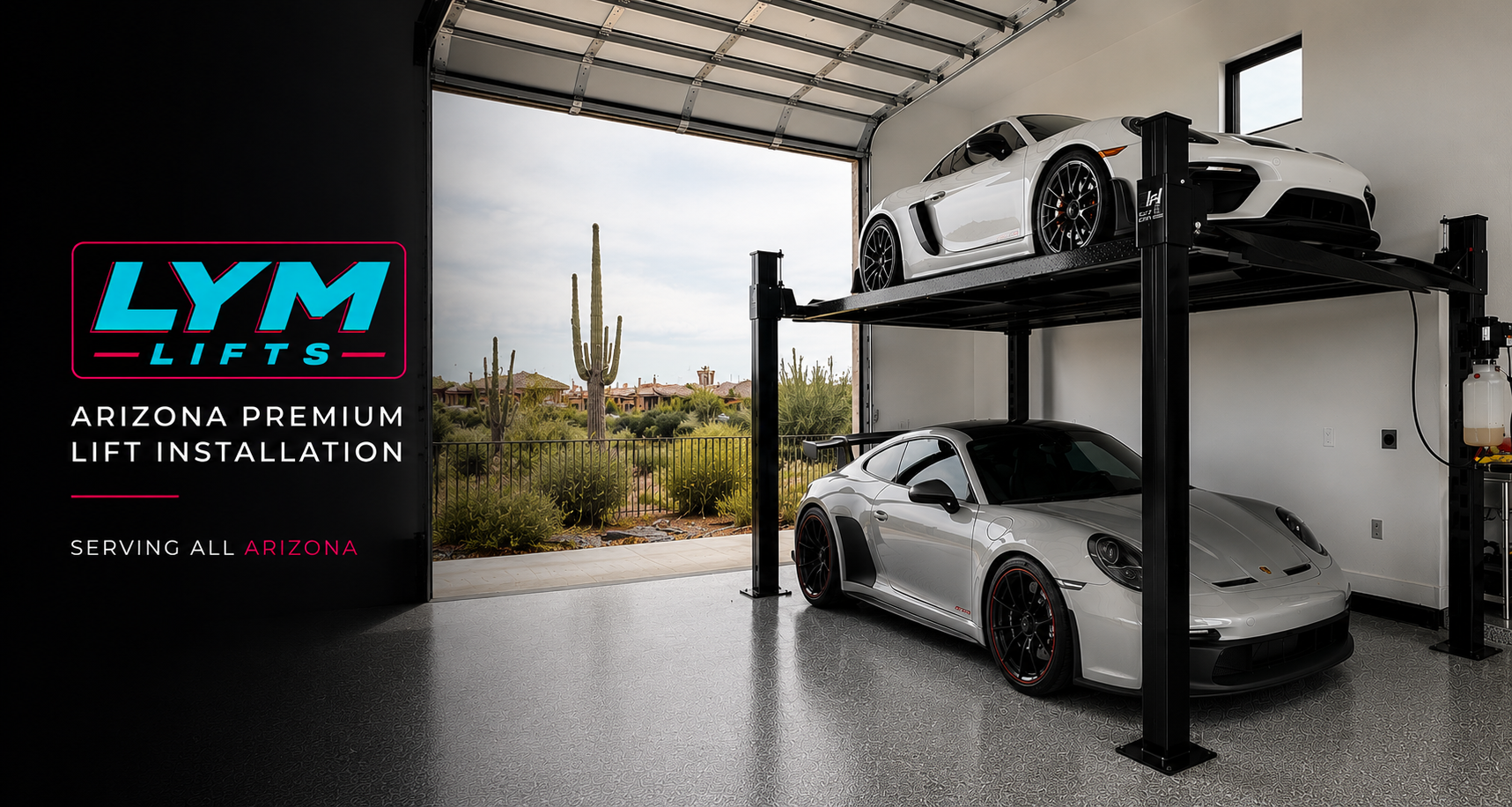 A two-level car lift with a white sports car on the ground level and a white sports car on the upper level inside a garage; outside the garage, desert landscape with cacti and houses visible through an open door.