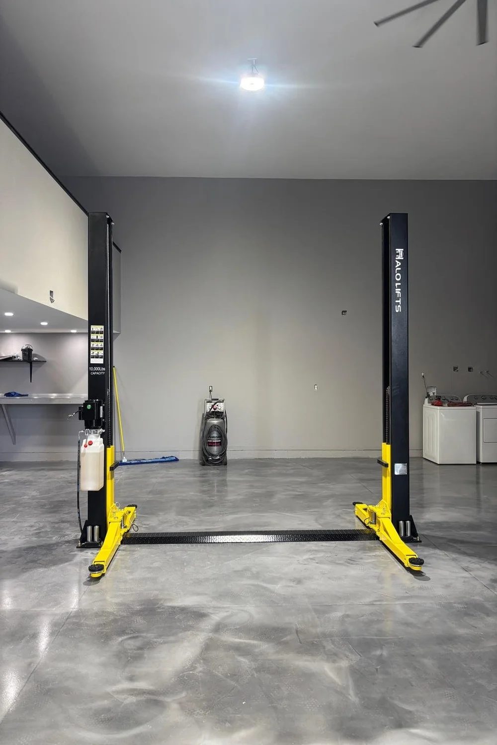 Halo two post lift installed in a Phoenix garage