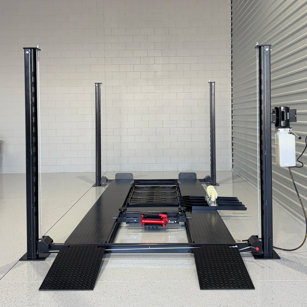 Halo 9k four post lift installed in a garage