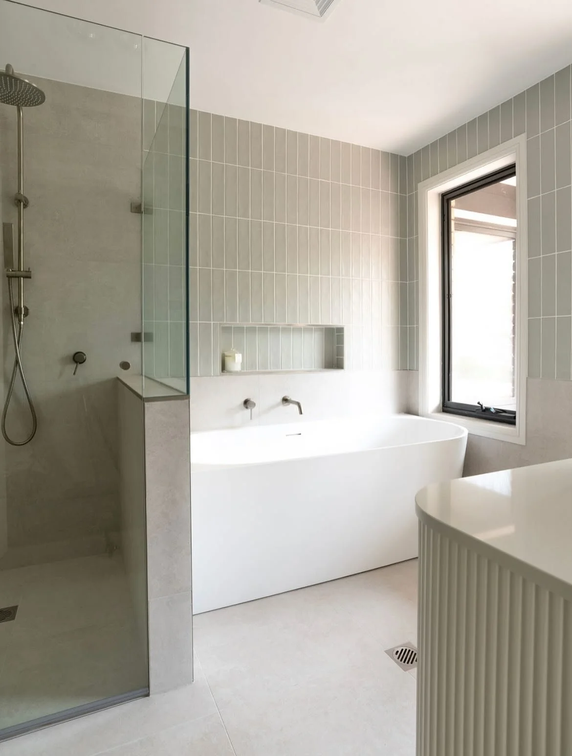 Muted green tiles bringing a soft, calming touch to this bathroom ✨
Fun fact: we tile all of our bathrooms ourselves, every detail, every grout line, done in-house for a flawless finish.
