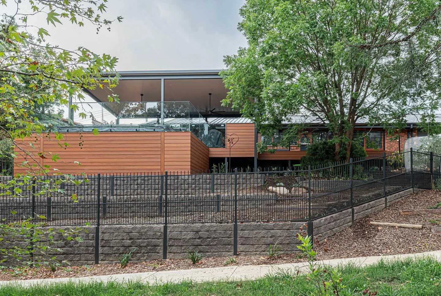 Big block. Bigger transformation.
Custom deck, retaining walls, and a full landscape overhaul to make this space more usable.