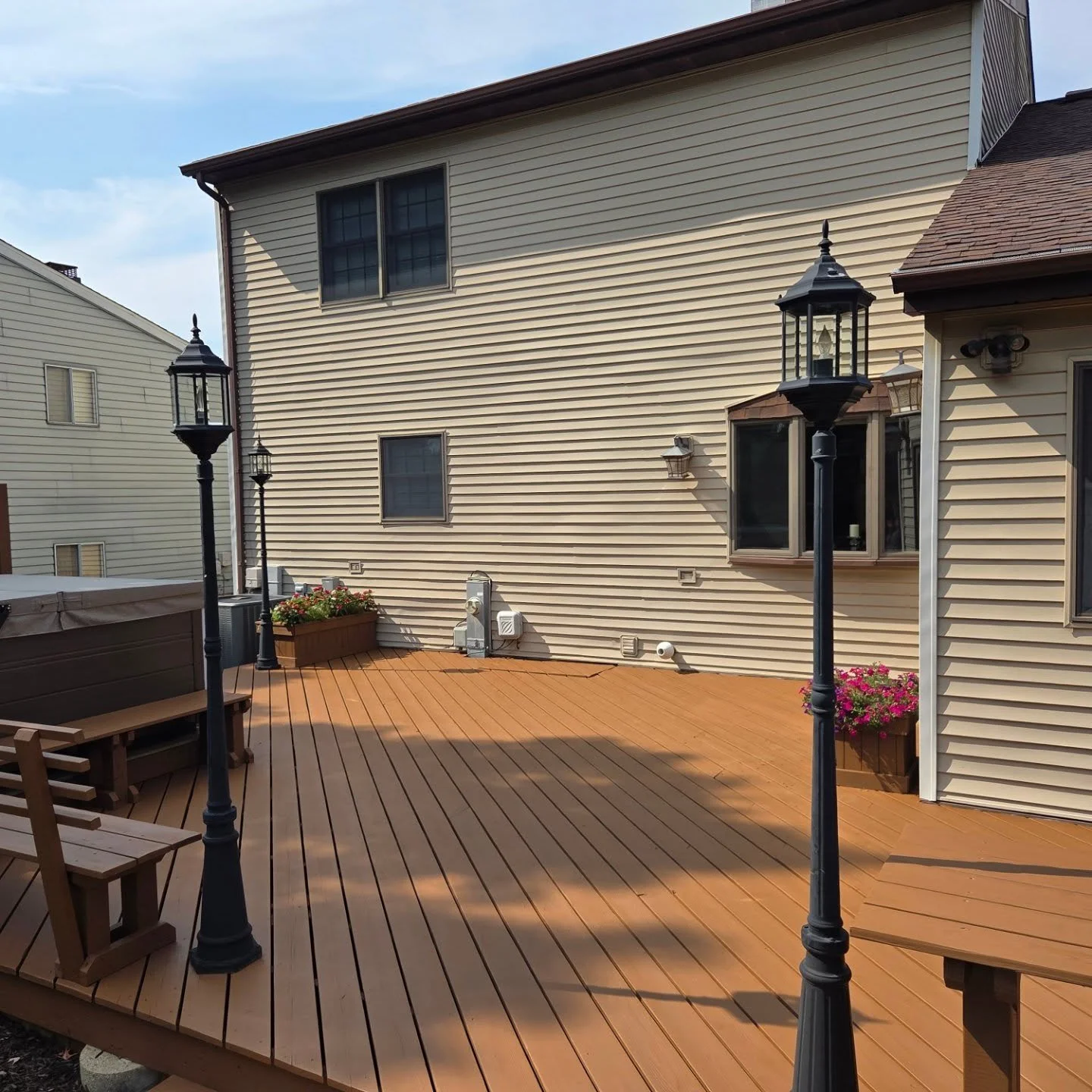 Decking stained with #benjaminmoore woodluxe stain.  Sanded and cleaned before applying solid stain. #stainingwood #deckstaining
