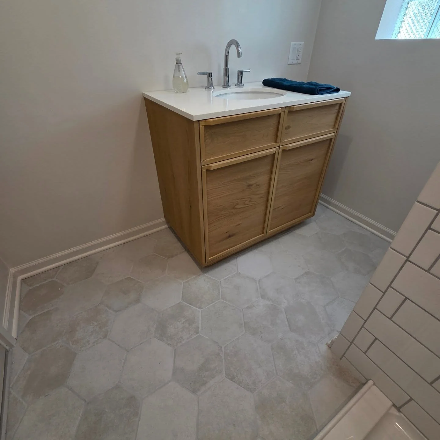 New basement bathroom with custom tile work and shower pan with brand new plumbing. #tiledesign #shower #plumbing