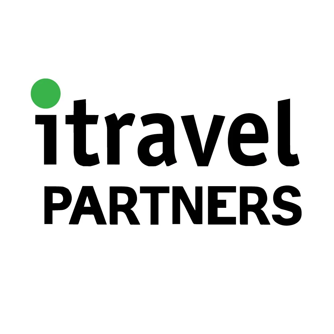 Travel Partners logo with the word 'it' in black lowercase letters and 'travel' in bold black lowercase letters, with a green dot over the 'i'.