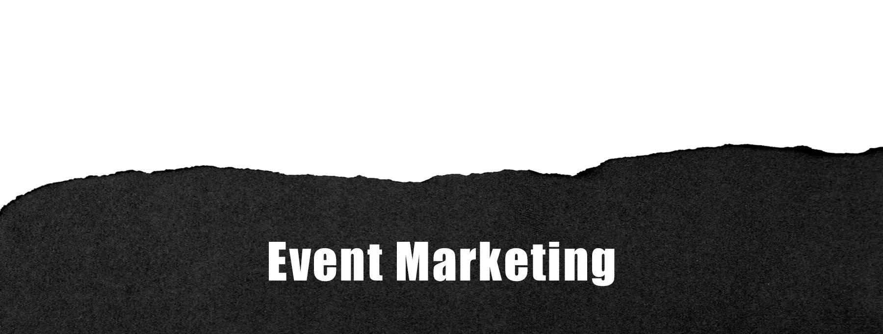 A black textured surface with white text that reads 'Event Marketing'.
