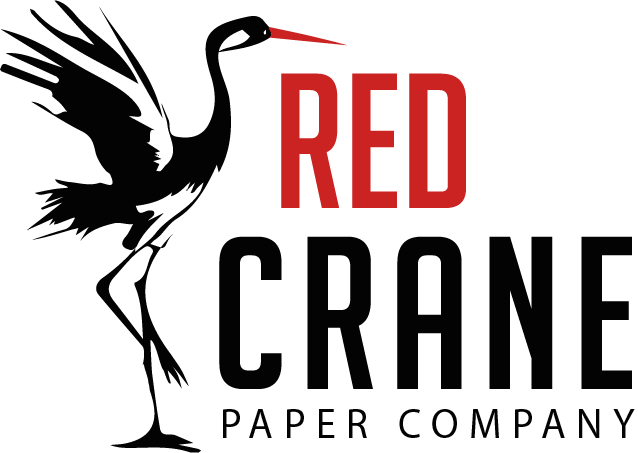 Logo of Red Crane Paper Company featuring a stylized black and white crane with red beak and the company name in red and black text.