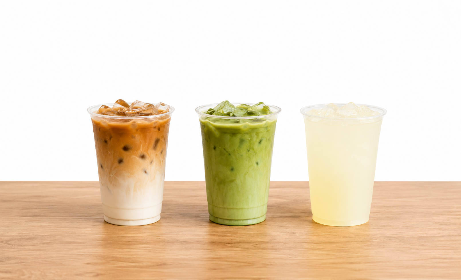 Three handcrafted iced beverages from Nurtured Sips: an iced latte, iced matcha latte, and lavender lemonade. This image is AI generated..