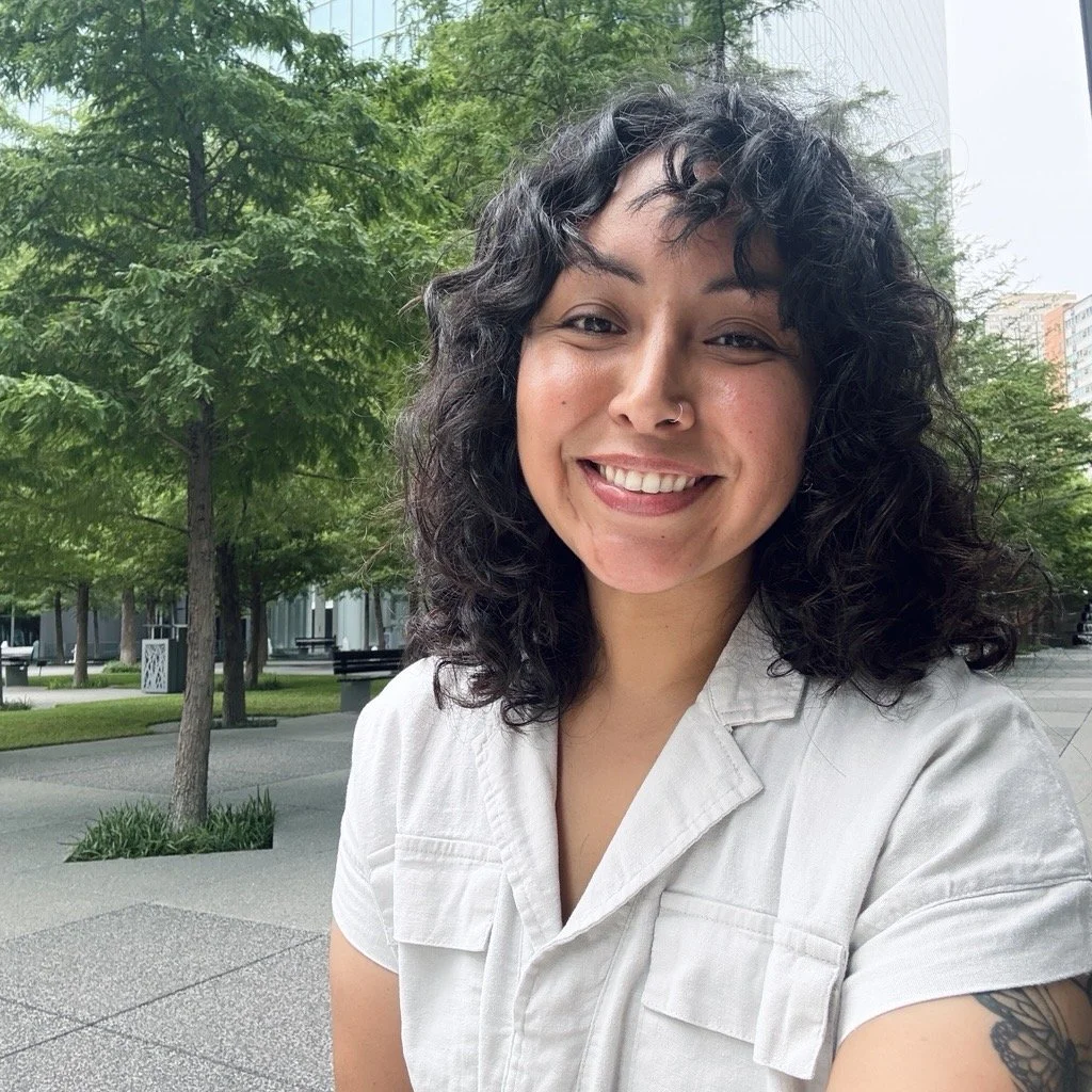 Victoria, founder of Nurtured Sips, smiling outdoors.