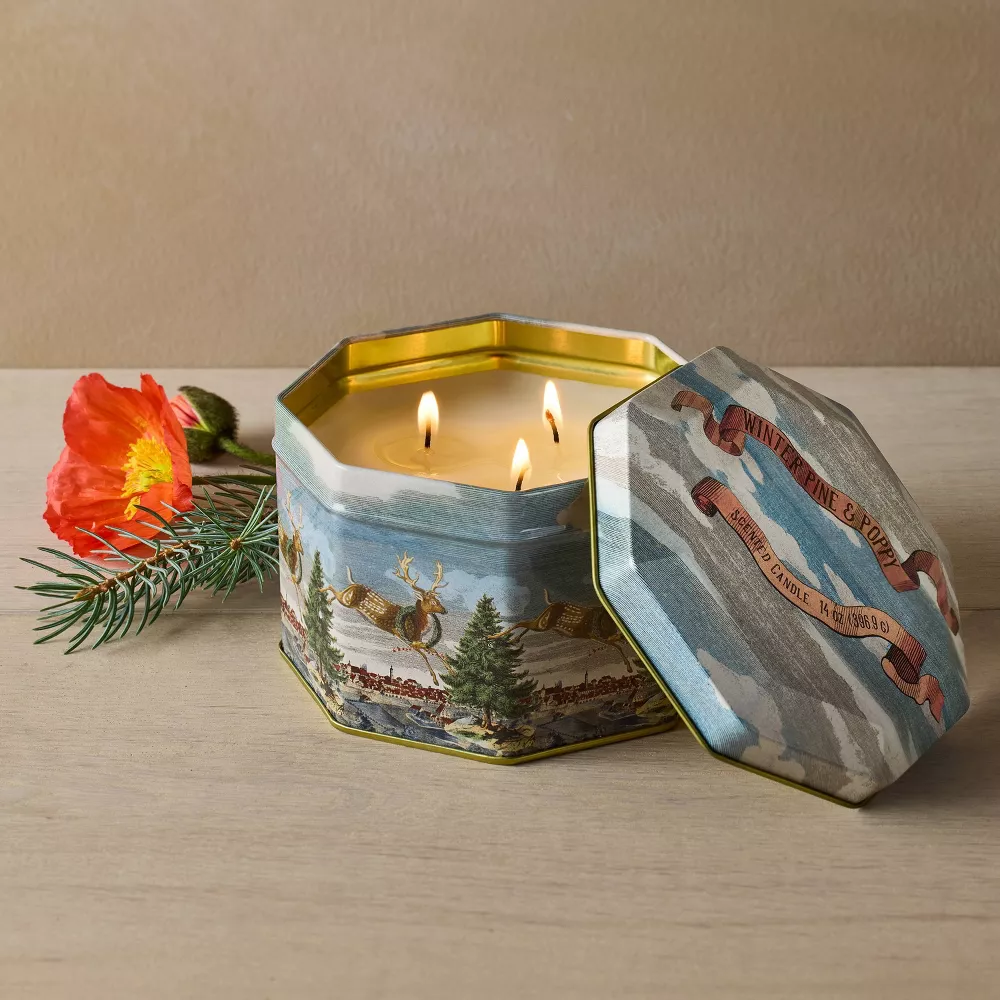 decorated candle tin