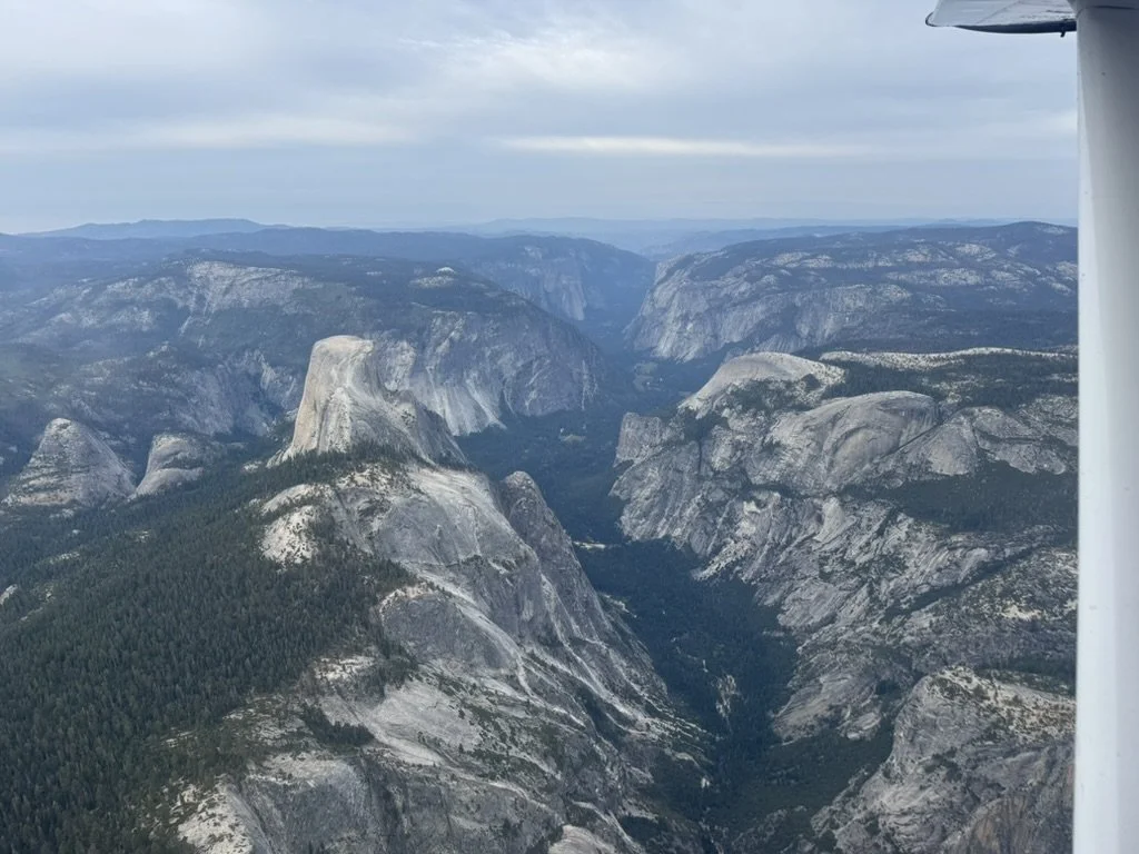 Yosemite National Park, Half Dome and El Capitan seen from North Tahoe Aviation air tour, sight seeing tour. Helicopter sightseeing tour. 