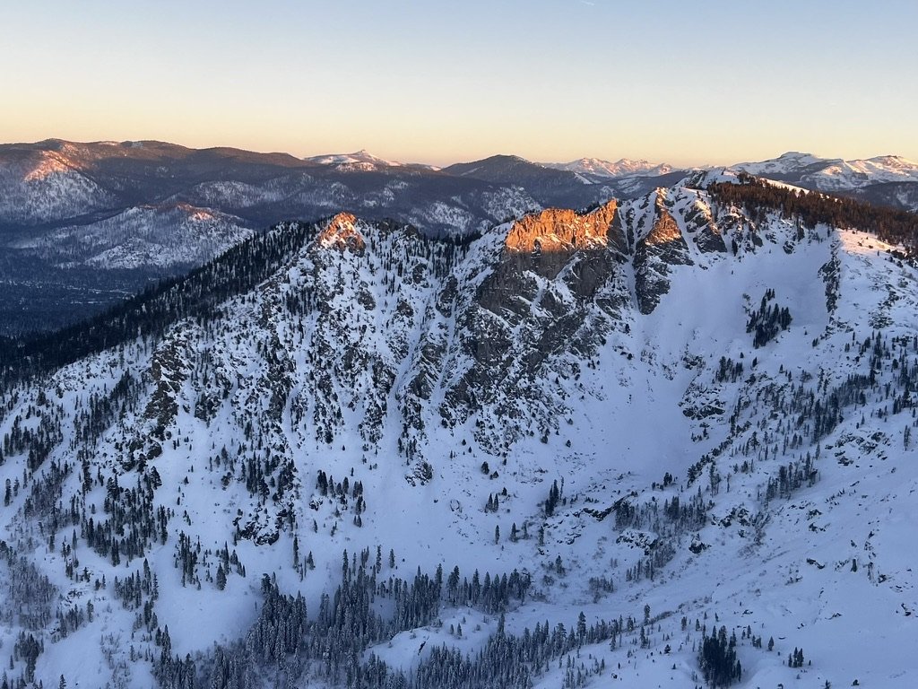 Snowy mountain in the alpenglow, as seen from a Cessna 180 bush plane.