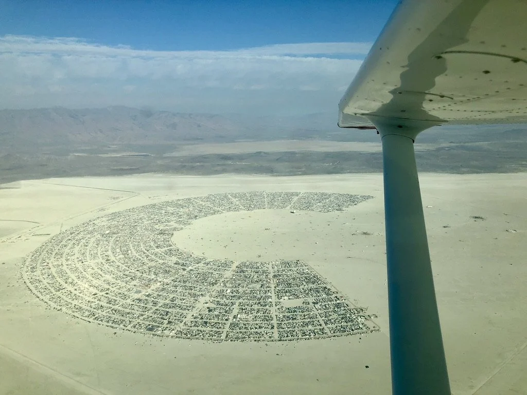 View of Black Rock City during Burning Man, taken from an airplane.