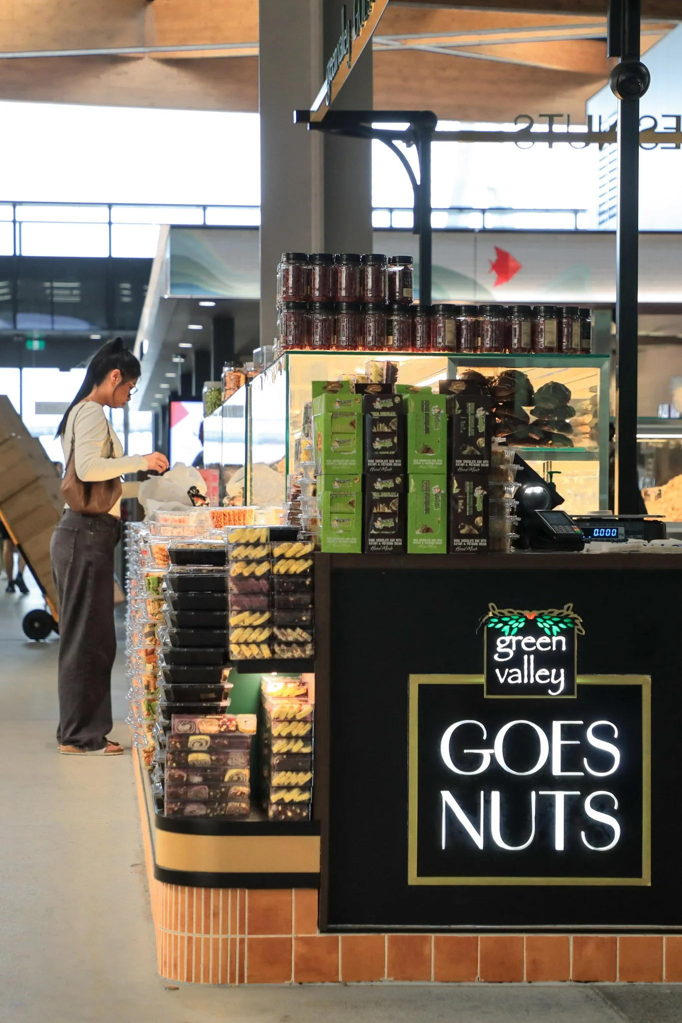Green Valley Goes Nuts Sydney Fish Market kiosk showcasing the completed retail environment, product displays and customer service counter.
