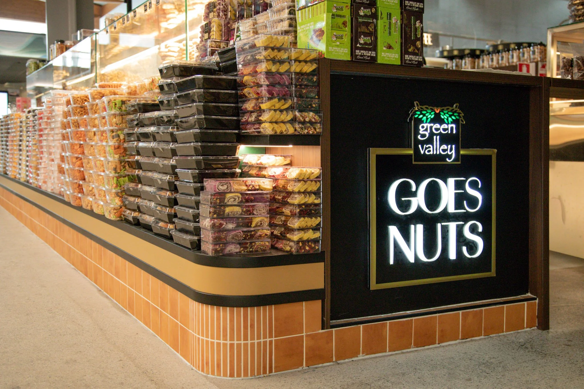 Green Valley Goes Nuts Sydney Fish Market kiosk showcasing the completed retail environment, product displays and customer service counter.