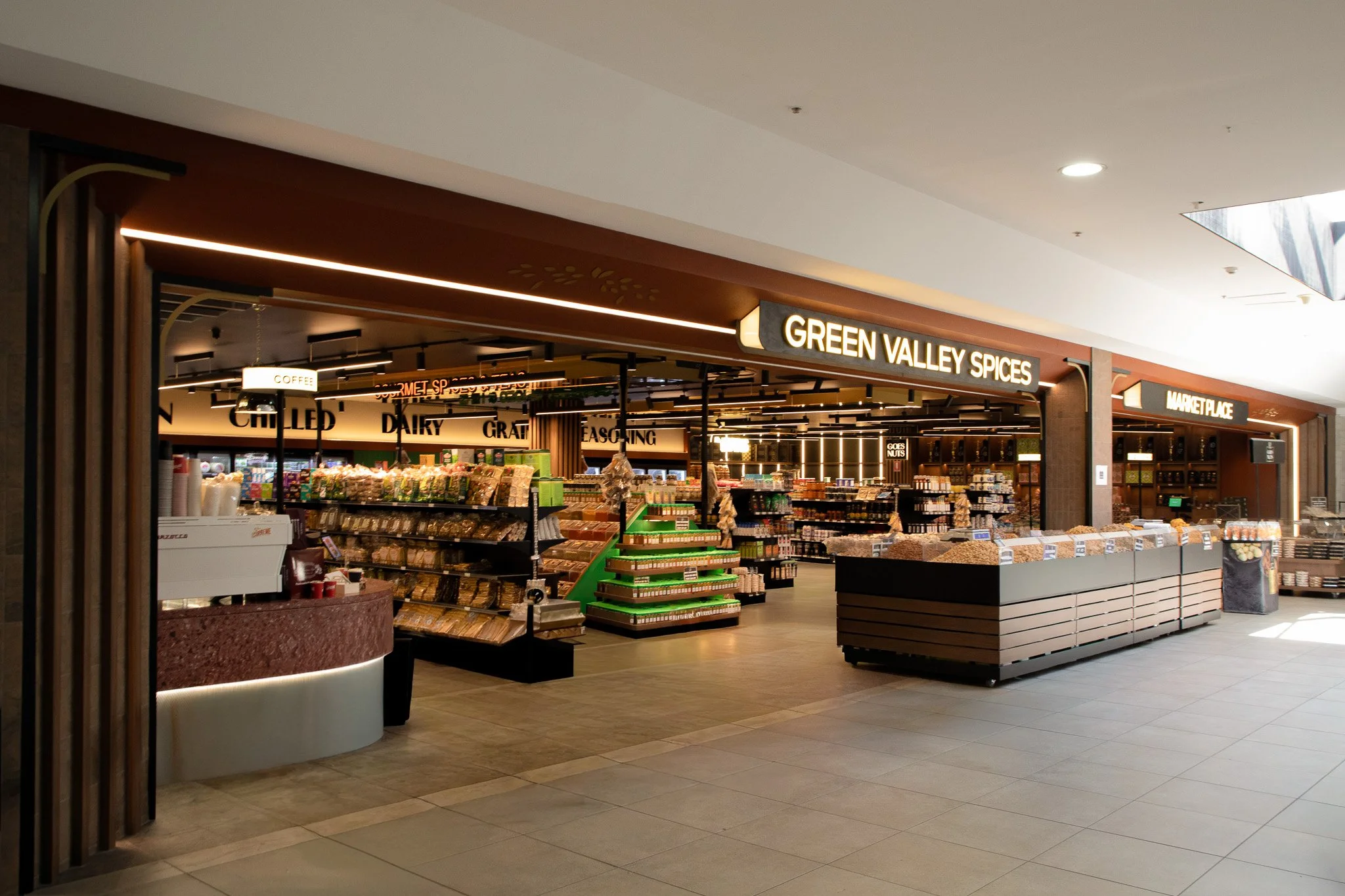 Completed Green Valley Spices Warrawong retail fit-out showcasing the store entrance, shopfront design and specialty food retail environment.