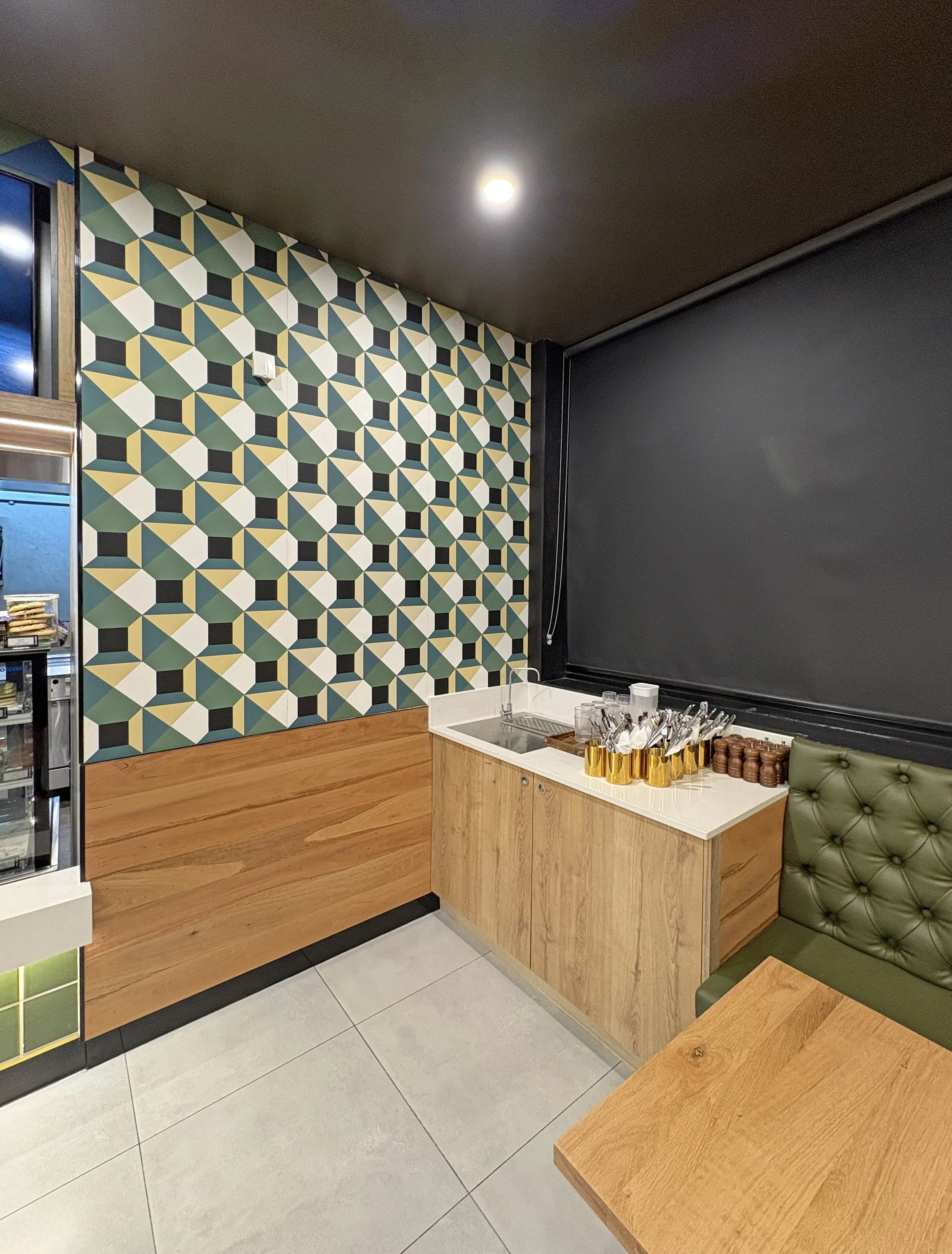 Custom self-service joinery at Oliver Brown Lake Macquarie designed to support an efficient customer experience within the completed café fit-out.