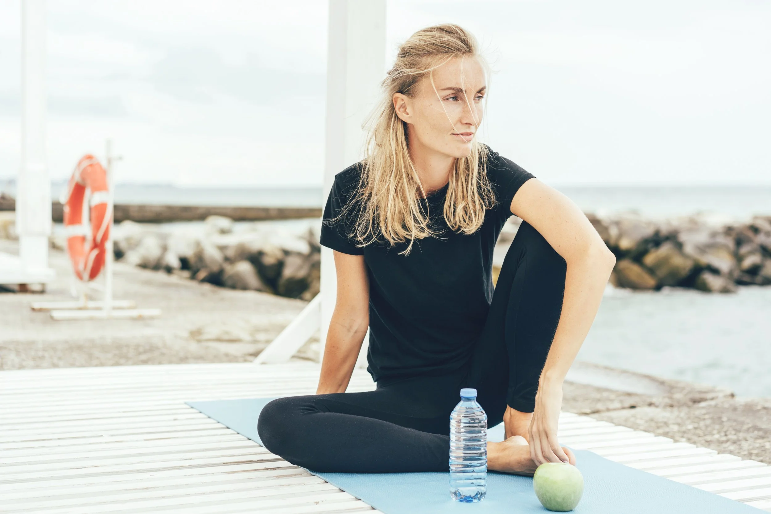 european-blond-woman-resting-after-workout-outside-2025-03-08-04-28-56-utc.jpg